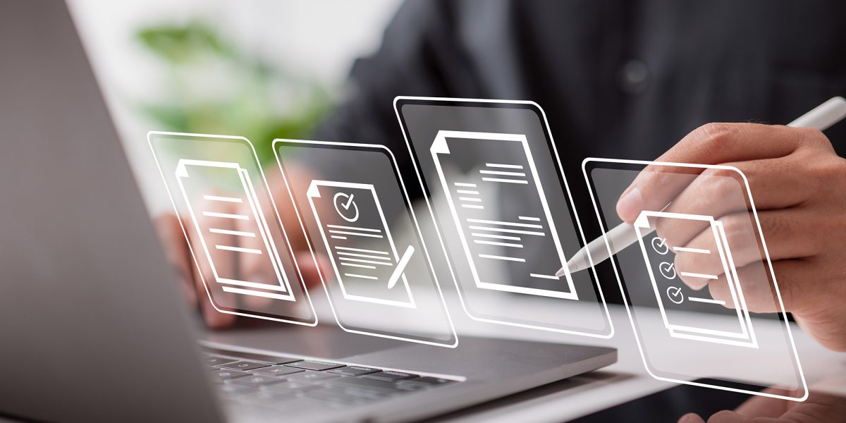Paperless workplace idea, e-signing, electronic signature, document management. Businessman signs an electronic document on a digital document on a virtual notebook screen using a stylus pen.
